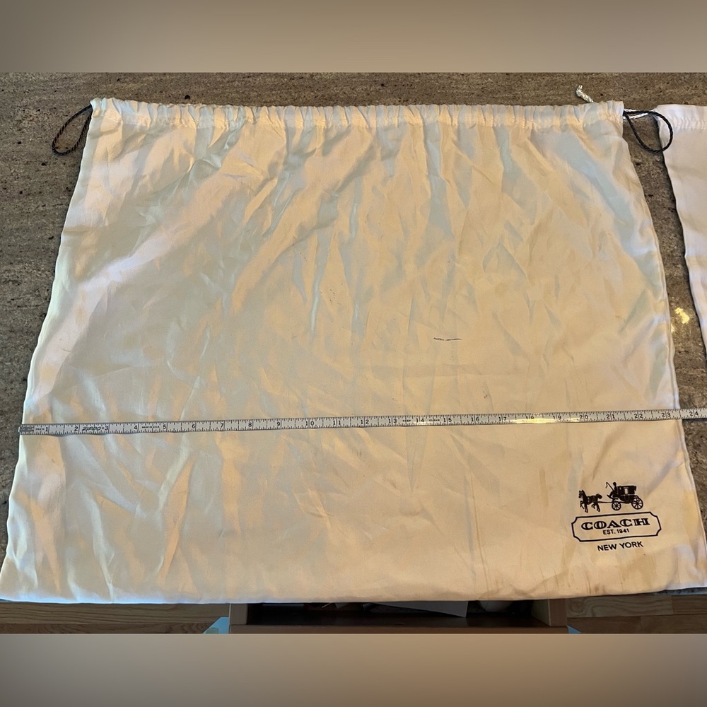 Two large coach dusters (White and Pearl) 23”x 19”